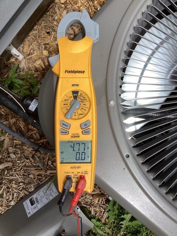 Completed scheduled air conditioning tune-up and maintenance on a 4-year-old system with no reported issues. Performed comprehensive inspection including cleaning of outdoor condensing unit, verification of clean air filter, and electrical diagnostics with amp draw measurements confirming all readings within normal operating parameters. System found to be in good working condition with all components functioning properly.