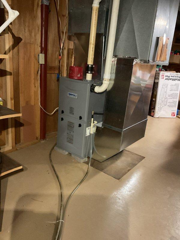 Completed comprehensive AC tune-up and maintenance agreement service on residential split system. Performed condensate drain flush to ensure proper drainage, cleaned condenser coil to restore optimal heat transfer efficiency, and verified system operation with 22° temperature split across evaporator coil. Identified weak capacitor during electrical component testing, consistent with previous year's findings, and provided estimate for replacement. All routine maintenance tasks completed per agreement specifications, and system confirmed operational upon departure.