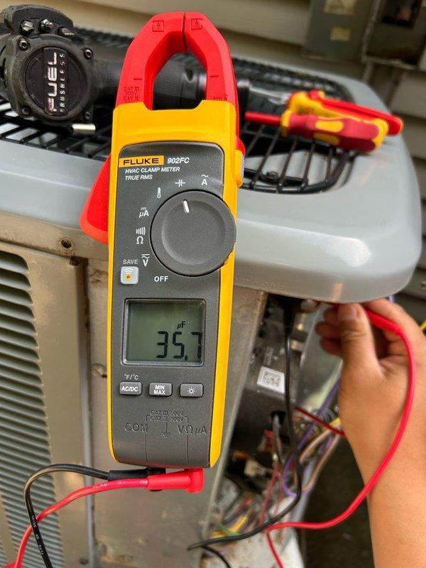 Completed comprehensive AC tune-up and maintenance inspection for agreement member, verifying all system components including thermostat function, filter condition, blower assembly, outdoor coil, electrical components, contactor, capacitor, condensate drain, refrigerant performance, and temperature split. All readings found within normal operating range with no mechanical defects or safety issues identified. Noted capacitor reading on one unit measuring slightly low and recommended continued monitoring, regular filter changes, coil maintenance, and routine tune-ups to ensure optimal system performance.