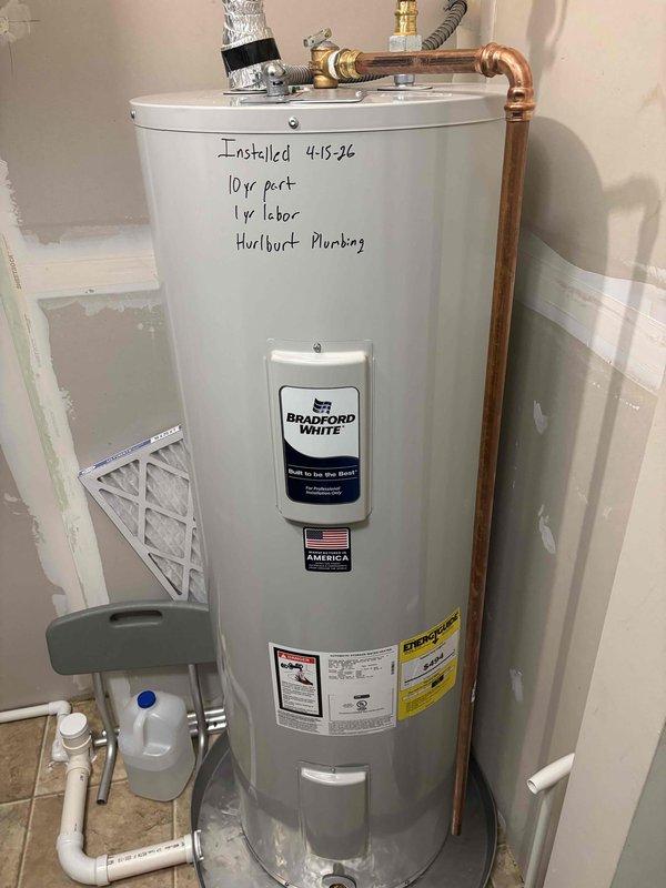 Performed comprehensive A/C maintenance on single condenser unit with R-410A refrigerant system. Conducted full system inspection including filter, thermostat, temperature drop measurement, condenser coils, motors, capacitors, compressor, refrigerant levels, and condensate drain. System was reported to be running extended cycles and struggling to maintain cooling during hot, humid conditions. Diagnostics revealed low refrigerant charge. Added UV leak detection dye and recharged system to proper operating levels. System tested and confirmed operating normally upon completion. Provided recommendations for future repairs and documented equipment specifications.