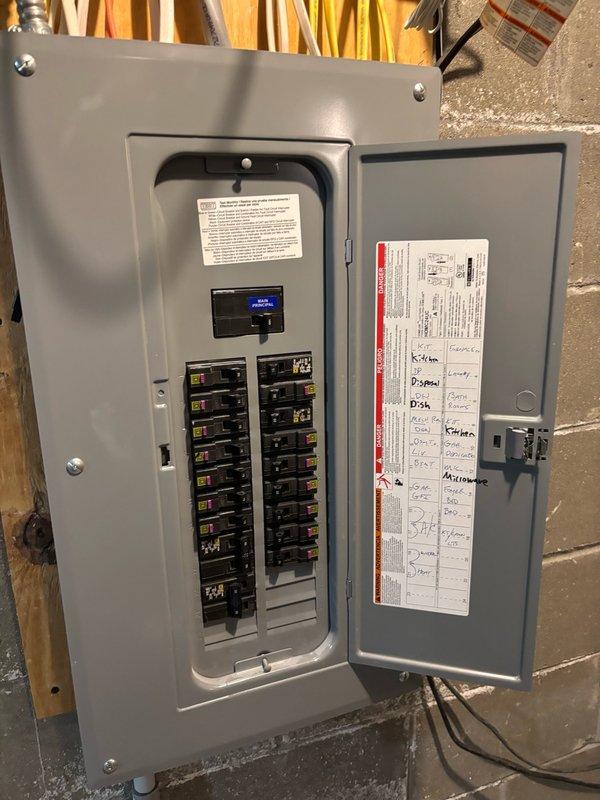 Responded to service call for 45-gallon electric Rheem water heater experiencing rapid hot water depletion and short cycling from hot to cold after only a few minutes of use. Upon arrival, proceeded to utility room to diagnose the issue. Performed electrical testing on both heating elements and thermostats, which all tested within normal operating parameters. Removed cold water inlet connection to inspect the dip tube assembly. Inspection revealed the dip tube had broken off, causing incoming cold water to mix directly with hot water at the top of the tank rather than being directed to the bottom, resulting in the reported symptoms. Documented findings with photographs of the water heater installation and electrical panel. Prepared estimate for dip tube replacement, which will require ordering the part for subsequent installation upon approval.