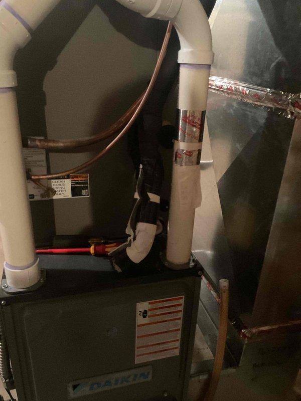 # Evaporator Coil Replacement Under Warranty

Replaced defective evaporator coil assembly covered under parts warranty due to failed drain pan with active leak. Removed existing coil from air handler unit and installed new Lennox evaporator coil obtained from parts supplier. Reconnected refrigerant lines using proper brazing techniques and verified all connections for integrity. Reconfigured PVC condensate drain piping to accommodate new coil installation, ensuring proper pitch and drainage flow. Tested system operation upon completion, confirming adequate airflow and proper condensate removal through drain system. Total installation time required four hours with helper assistance to complete coil changeout and associated piping modifications.