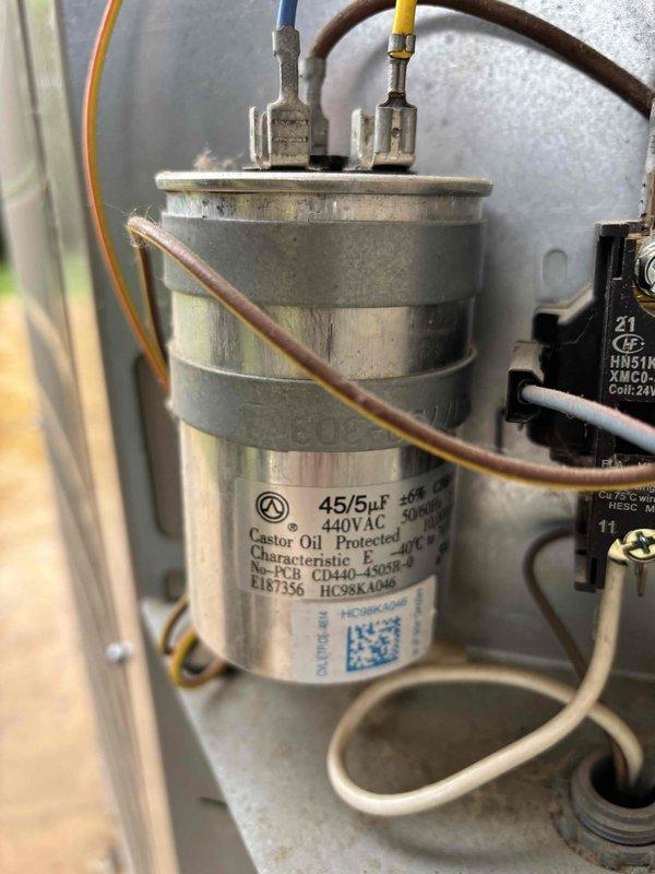 Completed comprehensive A/C maintenance on one R-410A condenser system with ambient temperature at 61 degrees. Performed full system inspection including filter, thermostat operation, temperature split measurement, condenser unit, evaporator and condenser coils, motors, capacitors, compressor functionality, refrigerant charge levels, and condensate drain line. Identified dual-run capacitor (45+5 μF) reading out of manufacturer specifications and recommended replacement for optimal system performance; customer declined repair at this time. Also recommended air filter replacement. System currently operating within normal parameters with no refrigerant leaks detected and all other components functioning as designed.