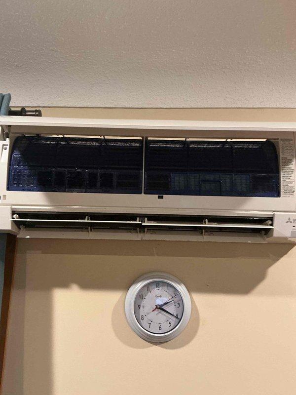 Completed annual cooling maintenance on Mitsubishi ductless mini-split system with one indoor head unit. Performed comprehensive inspection of unit components and identified buildup on blower assembly. Opened front panel to access internal components, removed and thoroughly cleaned blower wheels to restore optimal airflow and system efficiency. Verified filter condition and overall unit operation upon completion with no concerns noted.