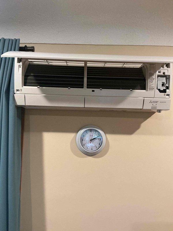 Completed annual cooling maintenance on Mitsubishi ductless mini-split system with one indoor head unit. Performed comprehensive inspection of unit components and identified buildup on blower assembly. Opened front panel to access internal components, removed and thoroughly cleaned blower wheels to restore optimal airflow and system efficiency. Verified filter condition and overall unit operation upon completion with no concerns noted.