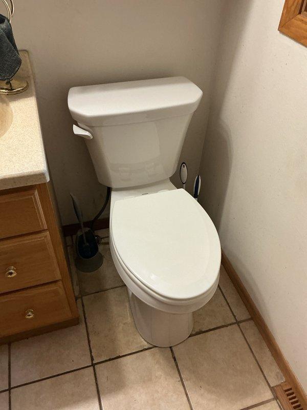 Responded to request for toilet replacement in upstairs bathroom. Removed existing standard-height toilet and installed new ADA-compliant height toilet matching unit previously installed in another bathroom. Verified proper seating, seal integrity, and flush operation upon completion.