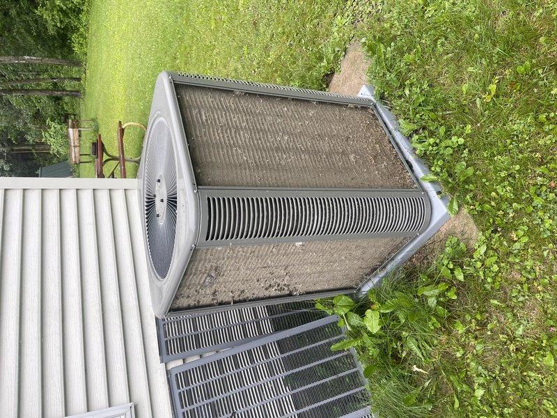 Completed annual air conditioning maintenance and tune-up on residential HVAC system. Performed comprehensive inspection of outdoor condenser unit, noting accumulated dirt and debris on exterior mesh panels typical of normal operation. Evaluated indoor air handler components including filter condition and mechanical connections. All systems tested and operating within normal parameters per manufacturer specifications.