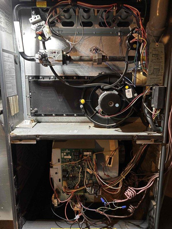 Completed comprehensive tune-up maintenance on one furnace and one R22 air conditioning system. Performed full furnace inspection including filter, CO levels, temperature split, burners, flame sensor, igniter, motors, capacitor, drain line, and heat exchanger—all components found operating within normal parameters. Conducted complete A/C maintenance on condenser unit with ambient temperature at 58 degrees, inspecting thermostat operation, temperature split, condenser coils, motors, capacitors, compressor, refrigerant charge levels, and condensate drain system. Replaced 20x25x4 air filter and verified both heating and cooling systems are functioning properly with no issues identified at time of service.