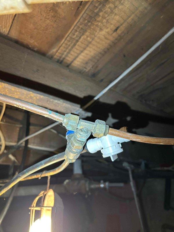 Responded to a gas leak reported behind the stove where a gas appliance was previously connected. Located the supply line tee in the basement, properly capped the connection point, and performed bubble testing to verify the integrity of the repair and confirm no further leakage. Relit the water heater pilot following completion of the gas work.