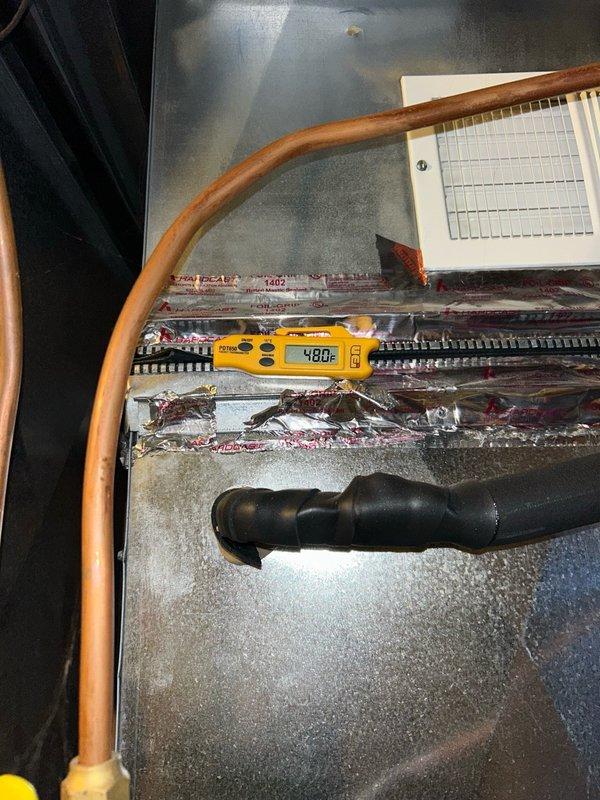 Performed comprehensive preventive maintenance inspection on air conditioning system. Verified furnace operation, confirmed filter condition acceptable, and checked condensate drain line for proper flow and drainage. Measured supply and return air temperature split at 20°F, indicating adequate system performance. 

Conducted outdoor unit inspection and found condenser coil moderately dirty with accumulated debris. Evaluated refrigerant circuit and confirmed system pressures and temperatures within manufacturer specifications for normal operation. Performed electrical diagnostics on compressor, measuring locked rotor amperage at 83.9A, which matched nameplate rating exactly.

Tested dual run capacitor using digital multimeter and identified compressor section reading 30 µF against rated specification of 45 µF, indicating significant capacitance loss. Fan motor capacitor section tested within acceptable tolerance range. Inspected contactor for pitting, burning, or wear and found contacts