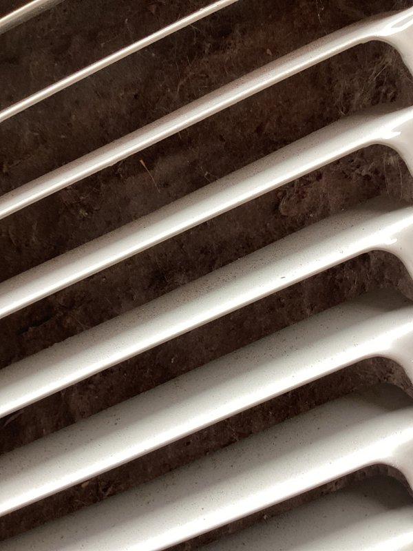 Responded to no cooling complaint on commercial split system. Upon inspection, found severely restricted airflow due to heavily soiled evaporator and condenser coils with significant dust and debris accumulation. Measured system pressures and found readings below normal operating range, indicating potential refrigerant charge issue that cannot be fully diagnosed until coils are properly cleaned. Evaporator coil cleaning will require invasive procedure including system pump down, cutting coil free from line set, thorough cleaning, re-brazing connections, and refrigerant charge verification. Given the age and overall condition of the equipment, combined with extent of required repairs, recommended full system replacement as most cost-effective long-term solution. Provided quote for step-one repairs including condenser coil cleaning, evaporator coil removal and cleaning with brazing, refrigerant charge check, and furnace filter replacement.