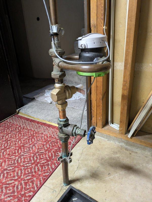 Responded to service call for low water pressure issue throughout residence. Upon inspection, diagnosed faulty pressure reducing valve (PRV) as the source of inadequate water pressure. Assessed existing plumbing assembly including copper piping, brass fittings, and shut-off valves. Documented current PRV condition and surrounding plumbing configuration. Provided estimate for complete pressure reducing valve replacement to restore proper water pressure to the home.
