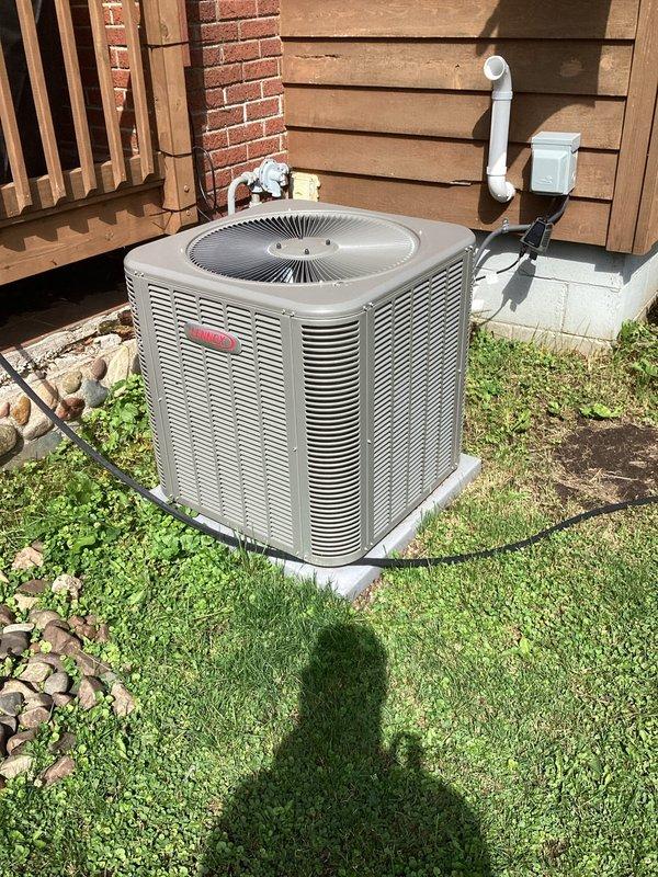 Completed annual air conditioning tune-up on one-year-old system. Performed comprehensive maintenance including inspection of condenser unit, verification of proper refrigerant levels, and filter assessment. System found to be clean and operating within normal parameters with no deficiencies noted.