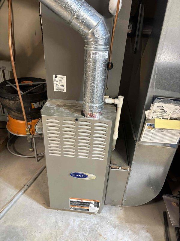 Completed annual AC maintenance tune-up on two separate condensing units and one mini-split system. Performed comprehensive inspections including filters, thermostats, temperature splits, condensers, coils, motors, capacitors, compressors, refrigerant levels, and drain lines on all systems. Both standard AC units utilize R-410A refrigerant and were serviced with ambient outdoor temperature at 65 degrees. Homeowner-provided 16x25x4 filters were noted for both conventional systems.

During inspection of the first AC unit, identified dual-run capacitor reading out of manufacturer specifications and recommended replacement with 40+5 MFD capacitor. Additionally, discovered contactor producing loud buzzing noise due to poor electrical contact, indicating imminent failure risk. Provided replacement estimates for both components; homeowner declined repairs at this time. Despite these findings, unit is currently operating within normal parameters.

Performed maintenance on mini-split system con