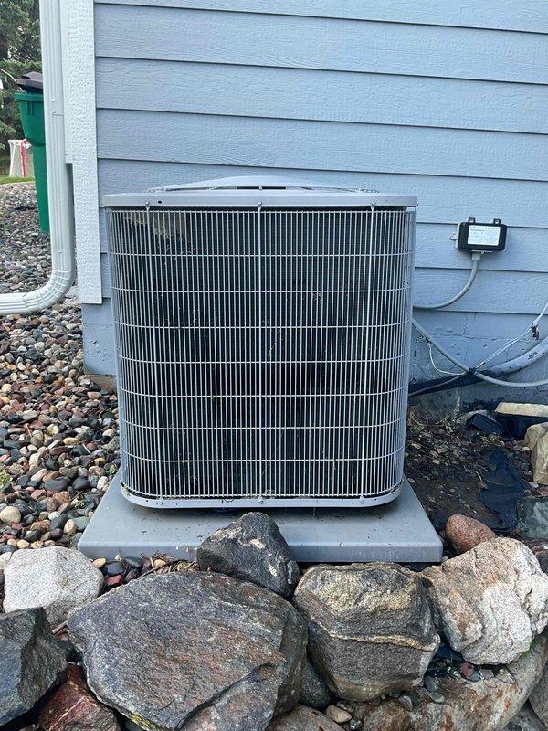 Completed annual preventive maintenance cooling visit on residential split system consisting of one air conditioning condenser unit and one air handler. Performed comprehensive tune-up including inspection of all major components, electrical connections, and refrigerant levels. Investigated customer report of thermostat malfunction following recent power surge. Diagnosed faulty contactor in outdoor unit, which was causing system failure. Replaced defective contactor with new unit, restoring proper system operation. Verified proper electrical connections at disconnect box and confirmed all safety controls functioning correctly. System tested and operating within manufacturer specifications upon completion.
