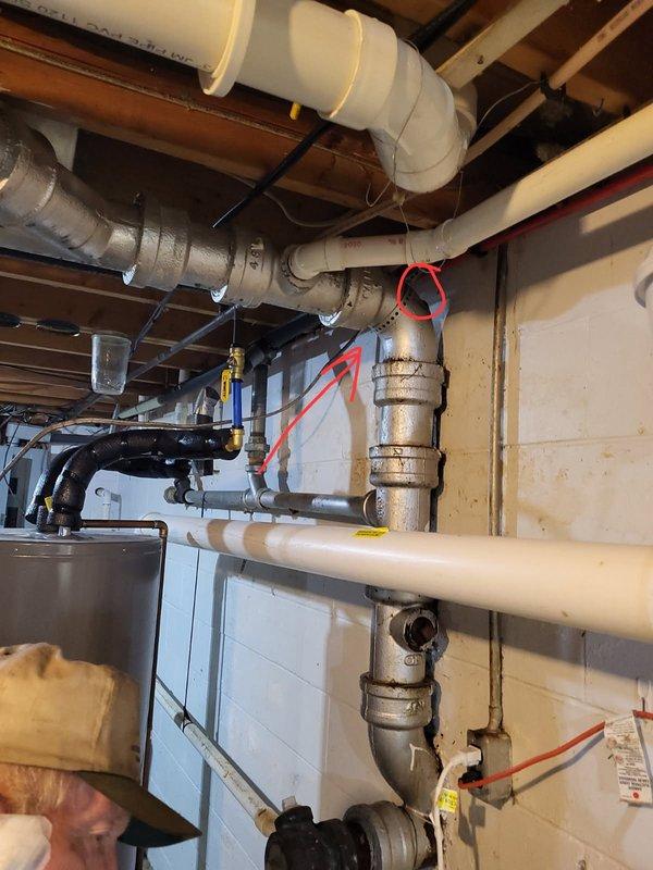 Responded to water leak call at residential property while homeowners were away. Upon inspection of basement plumbing system, discovered crack in main sewer cast iron pipe as reported, along with multiple additional holes in cast-iron and galvanized piping. Assessment revealed extensive corrosion and deterioration throughout aging cast-iron drain system, with visible oxidation and structural compromise at multiple joints and pipe sections. Water supply lines also exhibited significant wear and aging characteristics requiring attention. Documented all findings with photographs showing corroded metal piping, deteriorated pipe surfaces, and overall condition of basement plumbing infrastructure. Contacted homeowner to report comprehensive findings and coordinated follow-up appointment for detailed estimate on complete cast-iron system replacement and waterline repairs.