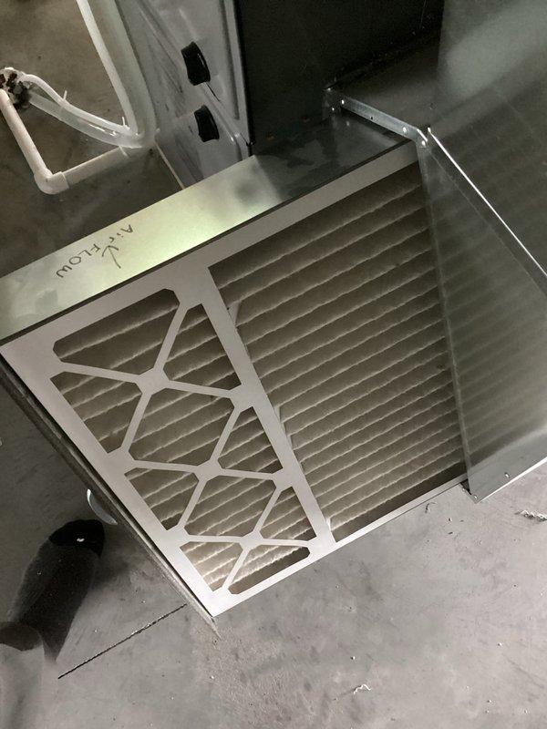 Completed comprehensive air conditioning tune-up and inspection on newer system. Verified all components are clean and operating within normal parameters. Smart thermostat displaying proper temperature readings and system cycling correctly. Inspected air filter showing good condition with proper airflow direction. Customer reported failed bathroom exhaust fan during visit; provided estimate for replacement unit.
