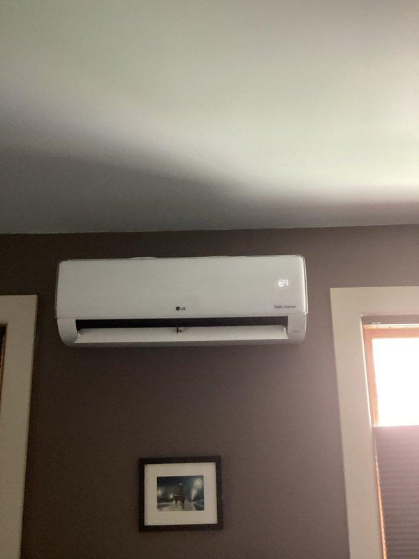 Completed annual maintenance and tune-up on LG ductless mini-split system. Inspected indoor wall-mounted air handler and exterior condenser unit, noting heavy frost accumulation on outdoor coil indicating potential refrigerant or airflow issue that will require monitoring. All system components operational at time of service.