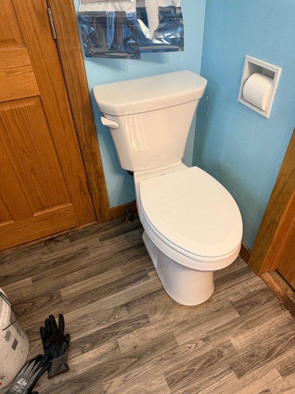 Responded to emergency call for clogged toilet with weak flush requiring plunging after each use. Diagnosed toy lodged in toilet trap. Attempted extraction for one hour using standard retrieval methods, but obstruction remained inaccessible due to location deep within the fixture's internal trapway. Removed existing toilet and installed new replacement unit to restore full functionality to the home's only bathroom facility.