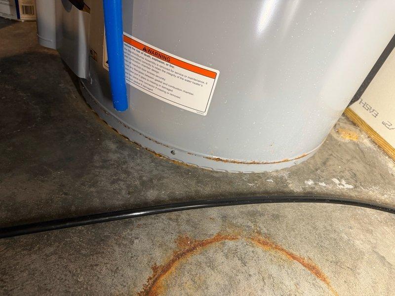 Completed comprehensive plumbing inspection as part of recurring maintenance program. Inspected water heater and identified corrosion at base of unit with rust staining on surrounding concrete floor, indicating potential leak or age-related deterioration requiring monitoring. Documented all plumbing systems, HVAC ductwork, and utility infrastructure throughout mechanical spaces to ensure proper operation and identify any maintenance concerns.