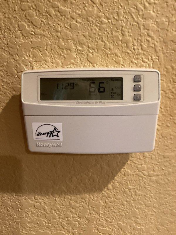 Completed annual cooling maintenance visit on two Trane condenser units. Performed comprehensive tune-up including amp draw verification, filter inspection, and temperature split measurements—all within normal operating parameters. Discovered evidence of rodent activity in electrical cabinet and addressed accordingly. Replaced humidifier pad with customer-supplied component and thoroughly cleaned exterior condenser units. Both systems operating properly with no concerns identified.