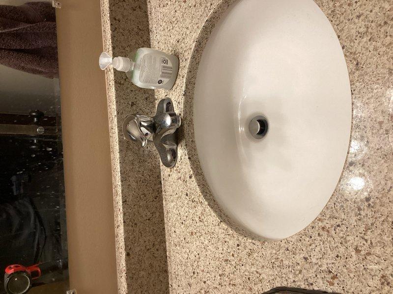 Completed comprehensive plumbing inspection of residential property, examining both concealed mechanical systems in ceiling space and fixture installations. Inspected overhead plumbing lines, pipe routing, and mounting systems, as well as bathroom sink plumbing connections, faucet assembly, and drainage components to verify proper operation and code compliance.