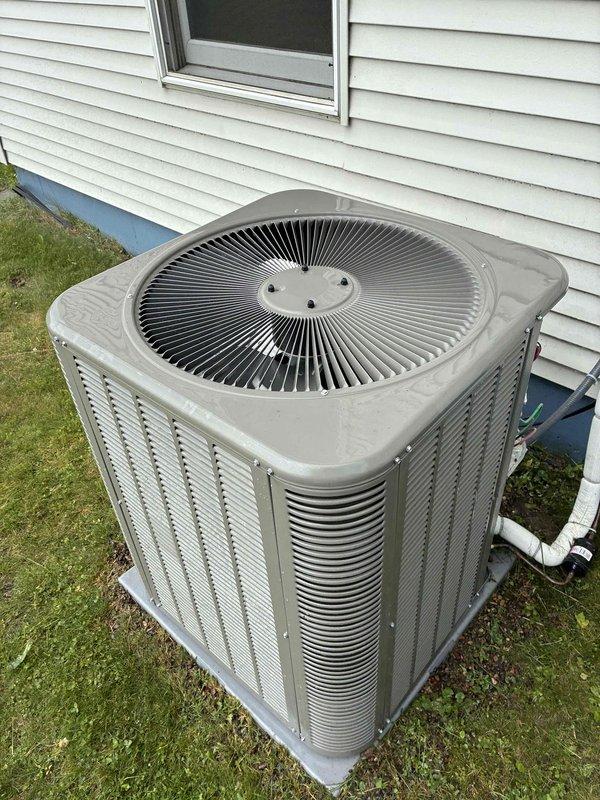 Completed preventive maintenance visit on residential air conditioning system. Cleaned outdoor condensing unit, tested capacitor and contactor with readings within manufacturer specifications, and replaced customer-supplied air filter. Inspected evaporator coil finding it clean, verified condensate drain line clear and flowing properly, and confirmed blower operating at appropriate speed. System demonstrated proper operation with 22-degree temperature differential across the coil, indicating adequate cooling performance with no deficiencies noted.