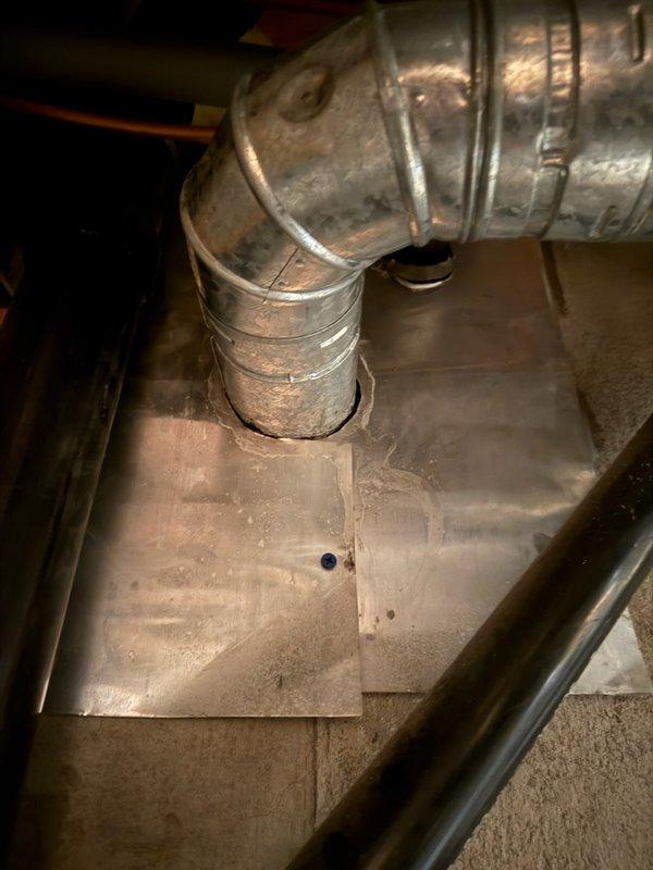 Conducted on-site evaluation of two existing water heaters in basement utility area, with one unit actively leaking. Assessed current plumbing configuration, including copper supply lines, relief valves, and venting system connections. Documented existing installation setup and provided estimate for replacement with single 80-gallon water heater unit to consolidate system and resolve leak issue.
