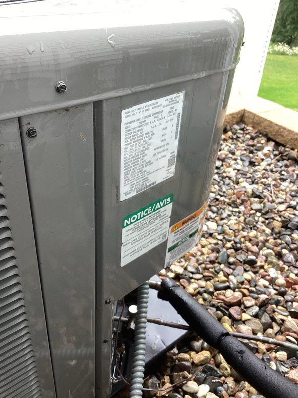 Completed routine maintenance agreement service on residential air conditioning system. Performed comprehensive AC tune-up including system inspection, cleaning, and operational testing. Temperature readings confirmed system operating within normal parameters at 125.7°F at measured component. Verified proper cooling performance, inspected outdoor condensing unit condition, and confirmed all safety labels present and legible. System found clean and functioning properly with no issues identified or repairs required.