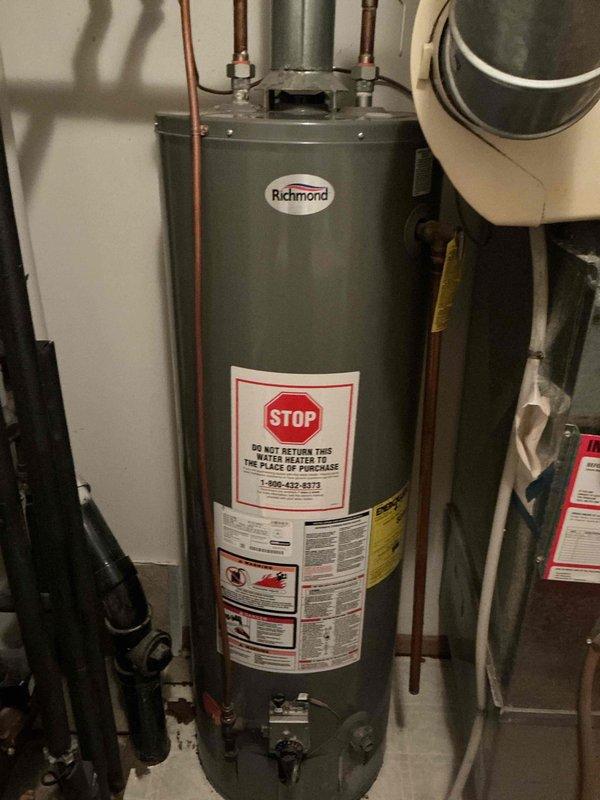 Performed comprehensive HVAC inspection on 27-year-old forced air gas furnace and air conditioning system for new homeowner. During furnace tune-up and inspection, discovered heat exchanger with multiple cracks in chambers on both sides of high limit switch, resulting in carbon monoxide leakage during operation. Determined furnace unsafe for operation with all original mechanical components showing signs of failure. AC system inspection revealed complete loss of refrigerant charge, indicating active leak in system containing obsolete R22 refrigerant. Documented findings with inspection camera photography showing heat exchanger damage and system conditions. Scheduled equipment replacement estimate for new furnace and air conditioning system.