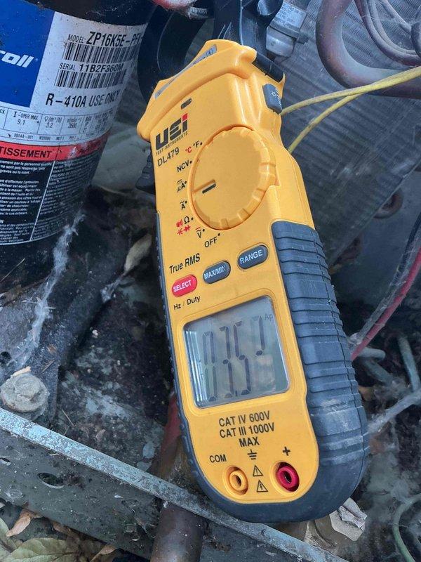 Completed annual cooling tune-up on 15-year-old Ruud AC system. Identified weak capacitor on compressor side, pressure fluctuations of 20psi indicating non-condensibles in refrigerant system, high compressor startup amp draw, and low temperature drop of 15 degrees. Replaced furnace filter, verified evaporator coil is clear, confirmed contactor and control board are functioning properly, and refrigerant charge is adequate. Discussed findings and repair options with homeowner and scheduled follow-up service advisor visit.