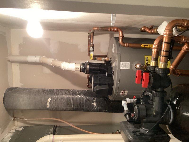 Completed comprehensive plumbing inspection of residential property as part of recurring maintenance service. Inspected HVAC system installation including copper piping network, red-handled isolation valves, PVC condensate drainage lines, and associated mechanical components in basement utility area. All plumbing systems, fixtures, and connections were visually examined and documented with photographs to verify proper operation and identify any potential maintenance concerns.