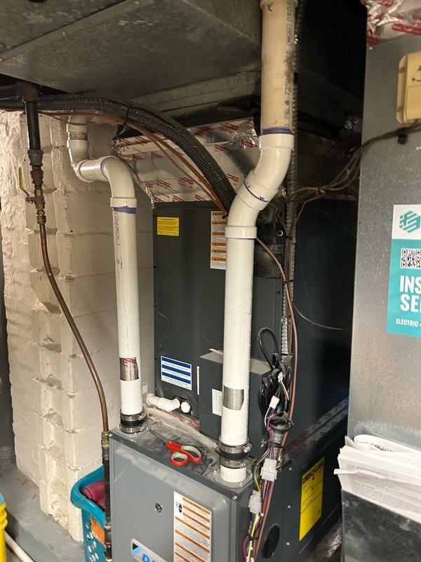 Completed comprehensive AC tune-up and maintenance inspection for preventive maintenance agreement member. Performed multi-point system evaluation including thermostat calibration, air filter assessment, blower assembly inspection, outdoor coil examination, electrical component testing, condensate drain verification, and refrigerant performance analysis with temperature split measurements recording 46.2°F supply air temperature. All system parameters tested within manufacturer specifications with no mechanical defects, safety concerns, or refrigerant issues identified. System operating at optimal efficiency with proper airflow, electrical function, and drainage confirmed throughout indoor air handler and outdoor condensing unit.