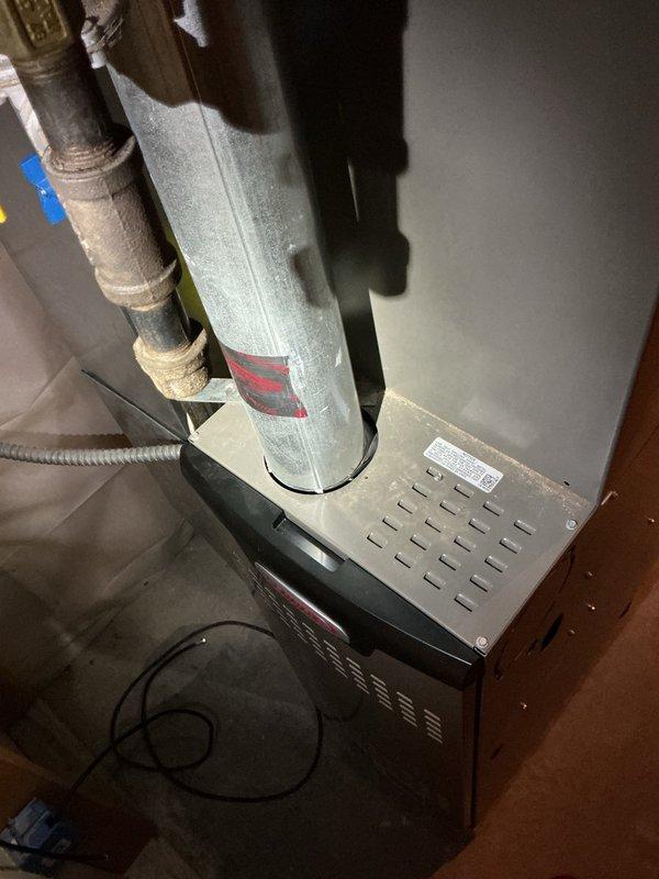 Completed Family Rewards cooling maintenance visit on residential AC system. Removed access panels and thoroughly rinsed condenser coils which were significantly plugged with debris. Performed electrical inspection with all connections and components found in good working order. Verified indoor air filter had been recently replaced. Confirmed evaporator drain line was draining properly with no blockages. Checked airflow and thermostat settings, all within proper parameters. Started system and monitored operation, confirming proper cooling performance with 20-degree temperature split across the coil.