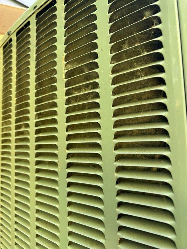 Completed annual air conditioning tune-up and comprehensive maintenance inspection on residential cooling system. Performed thorough evaluation of all major components including thermostat operation, air filter condition, blower assembly, outdoor condenser coil, electrical connections, contactor, capacitor, condensate drain system, refrigerant charge levels, and temperature differential across the evaporator coil. All operational readings measured within manufacturer specifications with no mechanical defects or safety concerns identified. System verified to be operating at proper efficiency levels. Documented dust accumulation on return air grille and provided maintenance recommendations including regular filter replacement, periodic coil cleaning, and continued scheduled preventive maintenance to ensure optimal performance and system longevity.