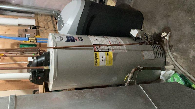 Responded to no hot water call and diagnosed 50-gallon natural gas water heater from 2011 experiencing gas lockout condition and failure to ignite. After confirming unit was non-operational and beyond economical repair, removed and replaced the existing water heater with new unit, reconnected all water supply lines, gas piping, and venting systems per manufacturer specifications and local code requirements.