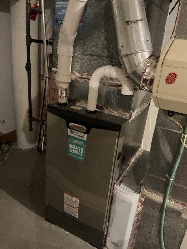 Completed annual cooling maintenance on two residential AC systems. Left side system inspected and found operating within specifications with proper refrigerant levels and all components functioning correctly. Right side system, connected to recently installed furnace, found completely empty of refrigerant and not cooling. Performed diagnostic testing on failed unit and documented condenser location near front of property. Scheduled same-day estimate for AC replacement system due to refrigerant loss and non-operational status.