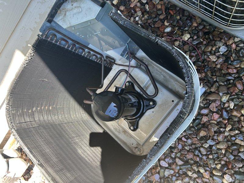 Completed comprehensive AC tune-up and maintenance inspection. Verified system operation and found clean filter. Discovered minor oil leak at blower motor with intact cap. Performed outdoor condenser unit cleaning and component inspection, repaired damaged wiring from animal activity. Conducted refrigerant pressure and temperature diagnostics revealing elevated superheat and subcooling levels with 15-degree temperature split, indicating potential low refrigerant charge and general system wear. Provided replacement recommendations for blower motor, condenser fan motor, and contactor to address aging components and optimize future performance.