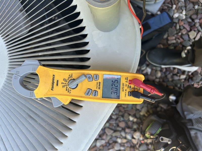 Completed comprehensive AC tune-up and maintenance inspection. Verified system operation and found clean filter. Discovered minor oil leak at blower motor with intact cap. Performed outdoor condenser unit cleaning and component inspection, repaired damaged wiring from animal activity. Conducted refrigerant pressure and temperature diagnostics revealing elevated superheat and subcooling levels with 15-degree temperature split, indicating potential low refrigerant charge and general system wear. Provided replacement recommendations for blower motor, condenser fan motor, and contactor to address aging components and optimize future performance.
