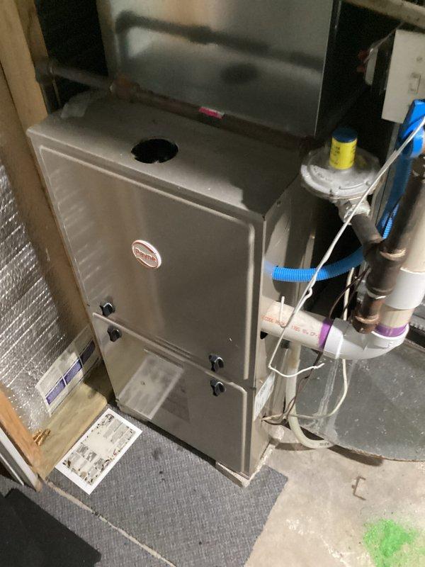 Performed warranty inspection on residential furnace system following previous diagnostic visit. Confirmed heat exchanger failure through visual inspection and documentation. Accessed internal components by removing furnace cabinet panels to examine burner assembly, gas valve, heat exchanger surfaces, and blower motor assembly. Captured detailed photographic documentation of failed heat exchanger and overall unit condition showing internal wiring, gas connections, and mechanical components. Submitted warranty claim information and technical documentation to parts department for manufacturer review and heat exchanger replacement authorization under existing warranty coverage.