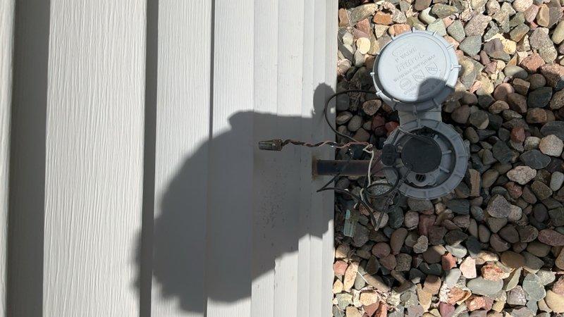 Responded to water leak complaint affecting interior of home. Upon inspection, identified leak originating from irrigation line at the pressure vacuum breaker (PVB) assembly located on building exterior. Documented condition with photographs showing corroded piping and PVB components. Submitted parts order request to prepare replacement estimate for damaged irrigation system components.