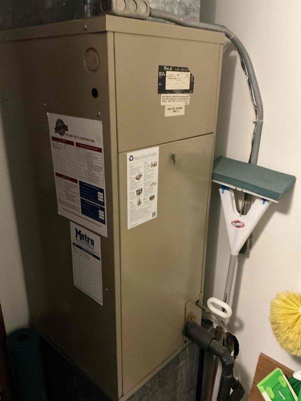 Performed AC tune-up on 28-year-old system and identified multiple critical issues requiring immediate attention. System found to be slightly low on refrigerant with 25-degree superheat and 30-degree vapor saturation readings, indicating potential leak that could cause coil freezing and condensation damage to interior ceiling/floor. Compressor operating at high amperage levels, confirming imminent failure. Capacitor had been recently replaced by previous service. Installed 16x20x1 filter during maintenance. Due to age of equipment and compressor failure, recommended complete system replacement and scheduled estimate for new AC installation.