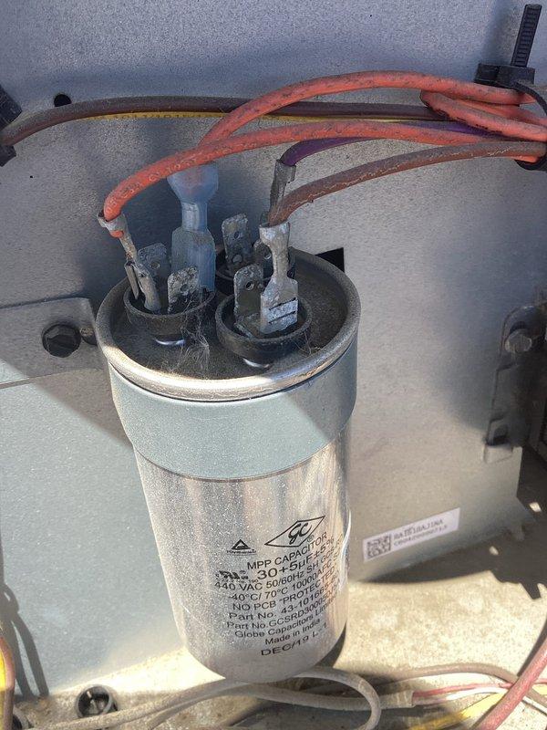 Completed AC tune-up on rooftop unit accessed via front desk key. Performed standard maintenance procedures and replaced 16x20x1 filter. Identified capacitor showing signs of terminal corrosion and near-end-of-life condition; replaced capacitor to prevent system failure.