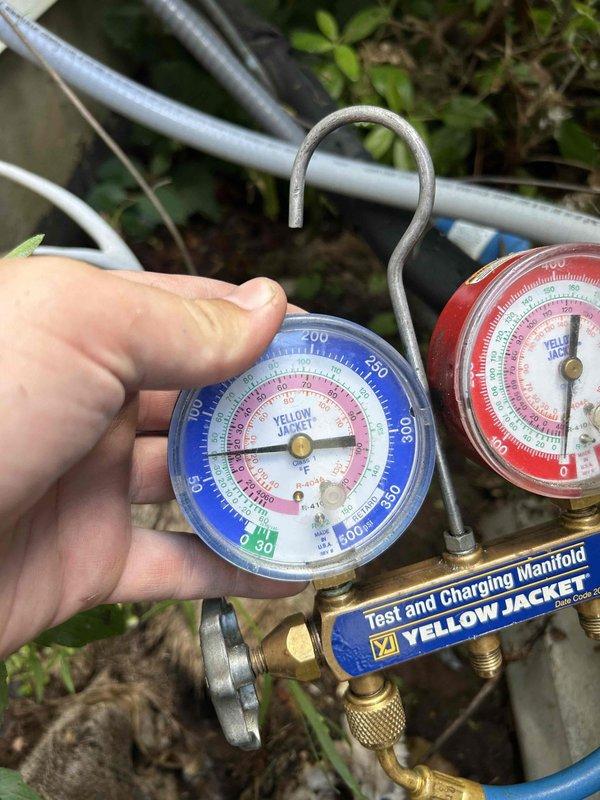 Completed comprehensive AC tune-up on 26-year-old air conditioning system under Family Rewards Program maintenance agreement. Cleaned outdoor condenser unit, repaired rodent-damaged electrical wiring, and performed full system diagnostics with pressure testing to verify proper refrigerant levels and component operation. System tested and confirmed cooling effectively with all components functioning within manufacturer specifications.