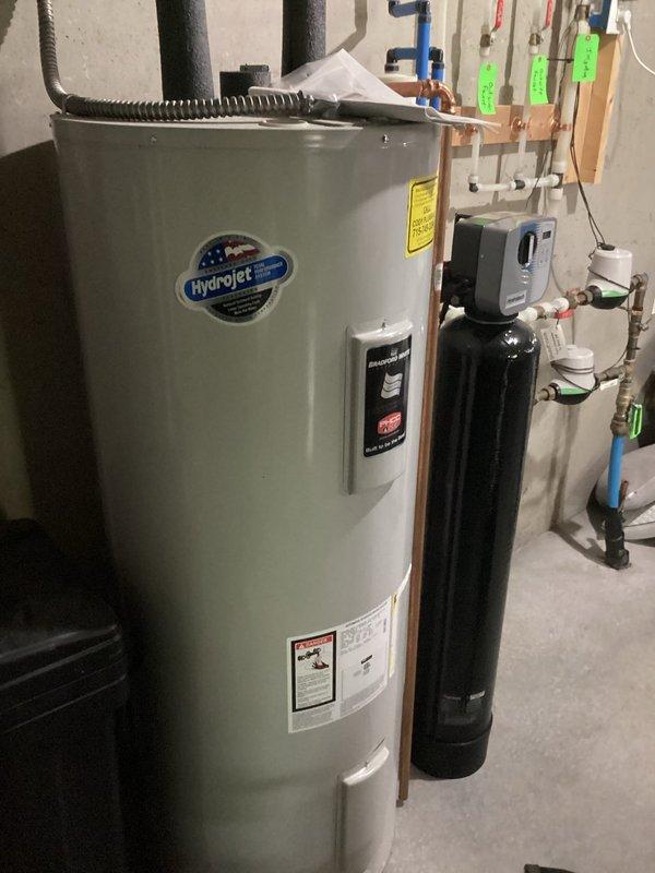 Completed annual air conditioning maintenance visit as part of recurring service agreement. Performed comprehensive system inspection and tune-up procedures, verifying all components are operating within normal parameters. System found to be clean with no deficiencies noted; unit running properly with supply air temperature measuring 52°F at the plenum.