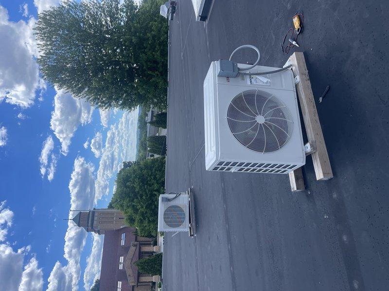 Responded to rooftop mini-split system for warranty motor replacement on previously diagnosed unit. Installed new condenser fan motor and performed operational test, during which motor exhibited abnormal rocking motion and failed to start properly. Control board suspected as secondary failure point but unavailable through parts department at time of service. Unit remains non-operational with power shut off at breaker pending parts availability and further diagnostic resolution.