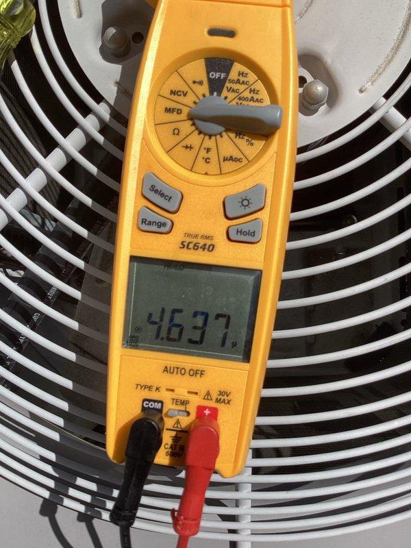 Performed comprehensive AC tune-up and inspection on residential HVAC system. Upon testing with digital multimeter, identified failed capacitor reading 46.77 MFD, which was outside acceptable operating range. Replaced defective capacitor with new unit, restoring system to proper working condition. Verified air filter was clean, confirmed outdoor condenser unit was free of debris, and measured temperature split across evaporator coil within manufacturer specifications. System tested and operating efficiently following repair.