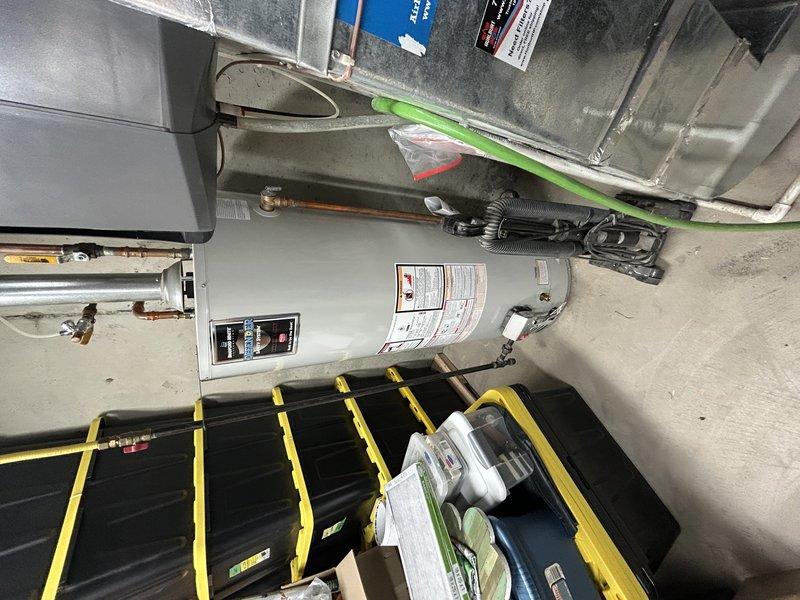 Completed comprehensive AC tune-up including system operation testing, condensate drain clearing, and condenser coil cleaning. Air filter inspected and found in acceptable condition, left in place. All components checked and verified proper operation with good temperature differential achieved in conditioned space.