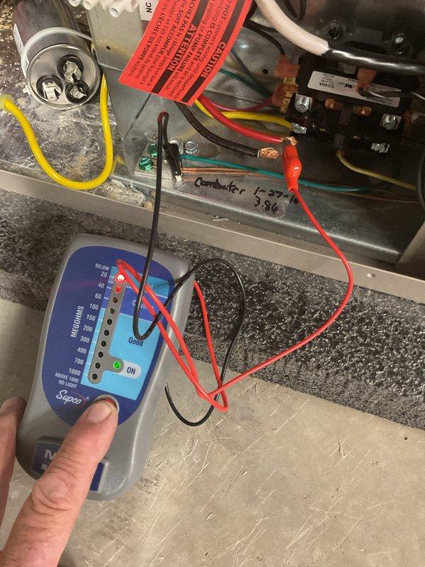 Responded to no cooling complaint on geothermal system producing lukewarm air with second stage cooling inoperative. Performed diagnostic testing using megohm meter on compressor and electrical components. Testing confirmed compressor failure due to electrical short circuit. Coordinated with sales team to schedule consultation for system replacement options including geothermal, air source heat pump, and standard air conditioning equipment.