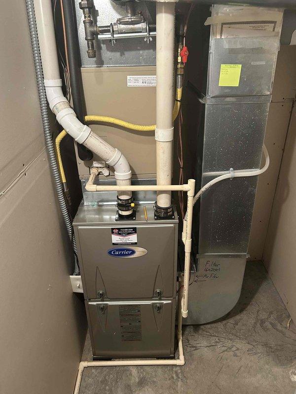 Completed Family Rewards Program cooling maintenance visit on Carrier HVAC system. Performed comprehensive tune-up including cleaning of routine components, testing all electrical and mechanical parts, and inspecting air filter. Verified proper operation of both indoor furnace/air handler unit and outdoor condenser unit, confirming system is running efficiently and ready for continued service.